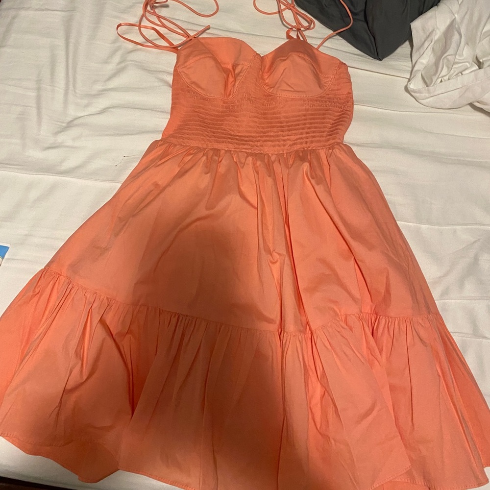 Staud mini dress in grapefruit color